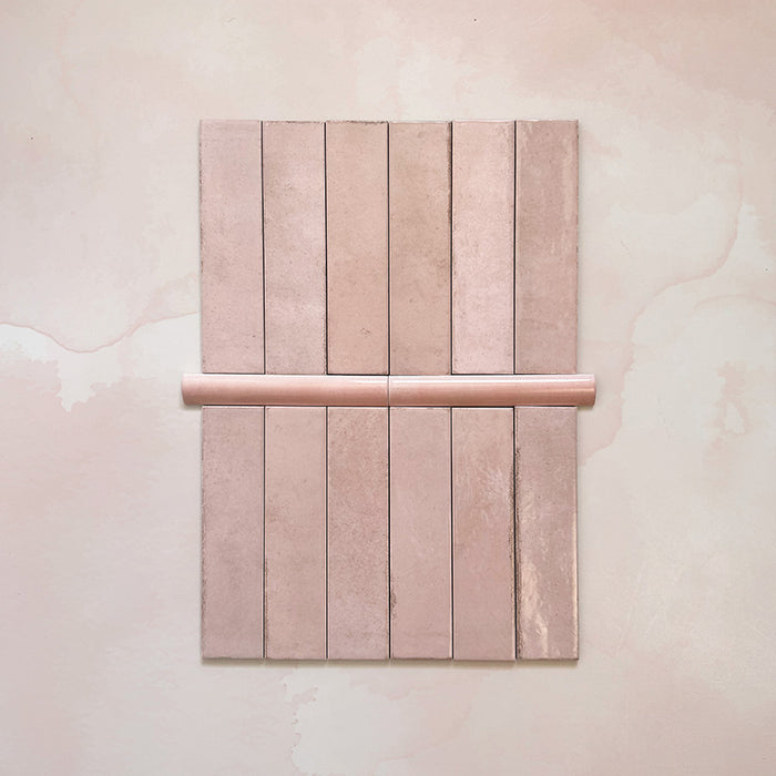 Madison Rose Bullnose Pencil Border Tiles 3x20cm — shown here with the matching Madison Rose brick tiles. The soft blush tone and smooth curved profile create a perfect finishing touch for edges and transitions, adding subtle elegance to any tiled space.