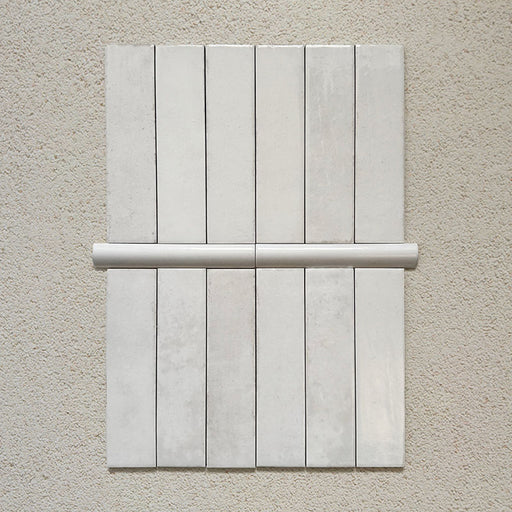 Madison White Bullnose Pencil Border Tiles 3x20cm — shown paired with Madison White Brick Wall Tiles. These slim, glossy trims offer a clean finishing touch that beautifully complements classic and contemporary layouts. Perfect for edging walls or framing feature areas.