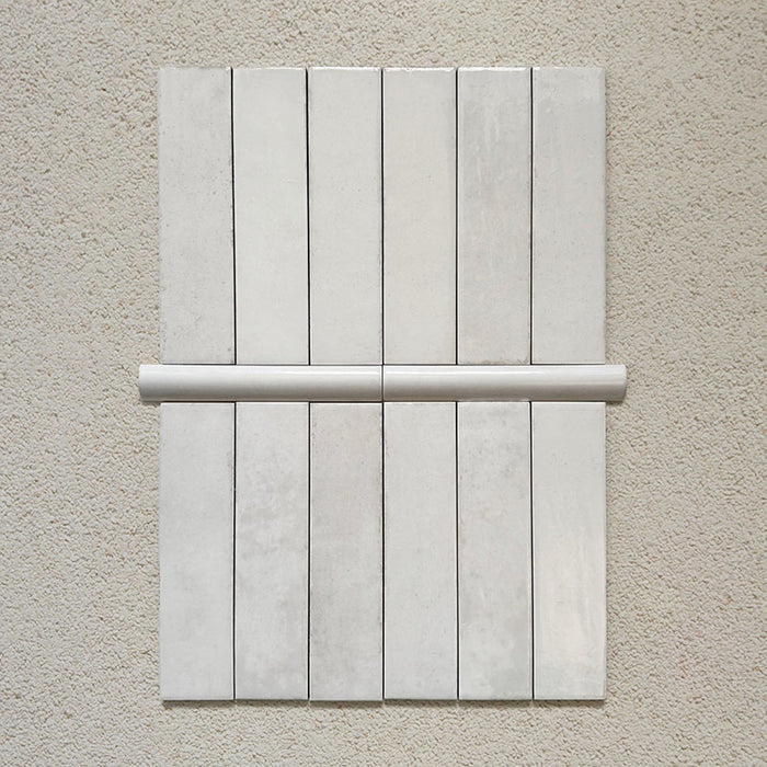 Madison White Bullnose Pencil Border Tiles 3x20cm — shown paired with Madison White Brick Wall Tiles. These slim, glossy trims offer a clean finishing touch that beautifully complements classic and contemporary layouts. Perfect for edging walls or framing feature areas.