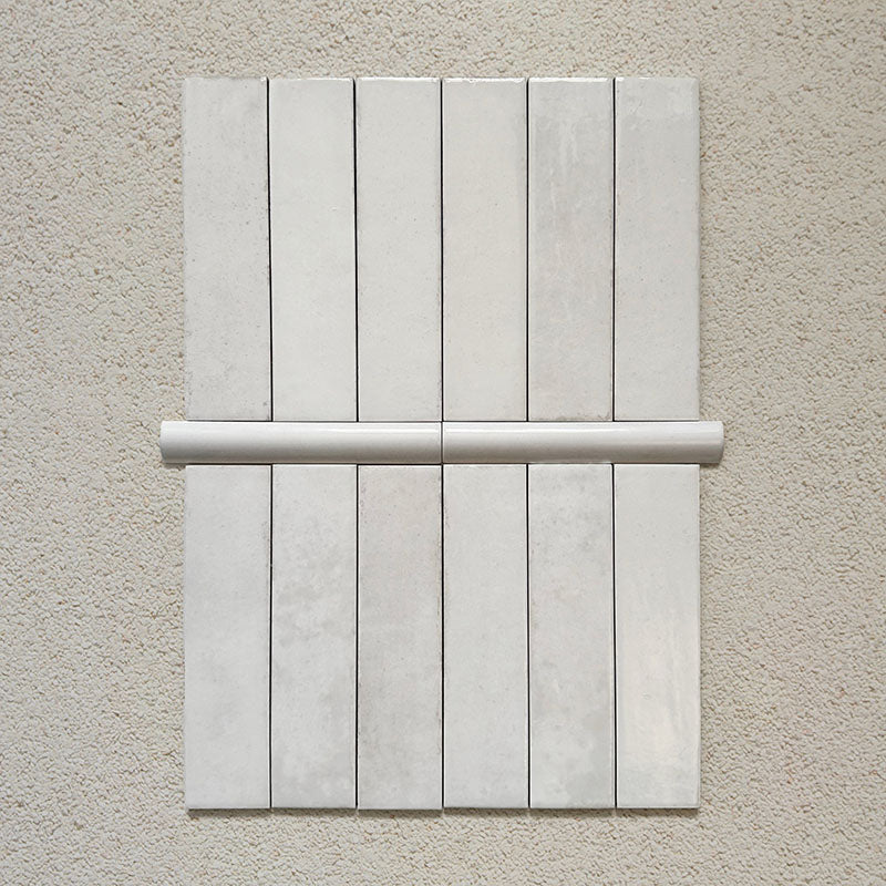 Madison White Bullnose Pencil Border Tiles 3x20cm — shown paired with Madison White Brick Wall Tiles. These slim, glossy trims offer a clean finishing touch that beautifully complements classic and contemporary layouts. Perfect for edging walls or framing feature areas.