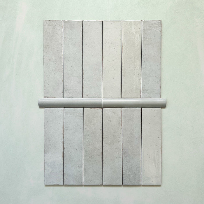 Madison Mint Green Bullnose Pencil Border Tiles 3x20cm — tiles paired with matching bullnose trim for a seamless finish. The glossy mint tones and rounded edging create a polished, handcrafted look ideal for borders, edges, and elegant wall detailing.