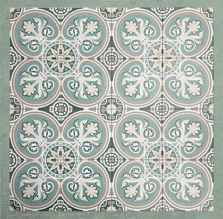 Group of Europa Toulouse 20x20cm Victorian Moroccan style tiles arranged together to display the repeating ornamental pattern in green, grey and cream tones, shown against a textured green background in a styled product layout.