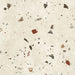 Tulsa Marfil 66 × 66cm terrazzo-effect porcelain wall and floor tiles, showcasing a warm ivory base with scattered multicoloured stone fragments in earthy beige, grey, and terracotta tones for a soft, contemporary terrazzo look.