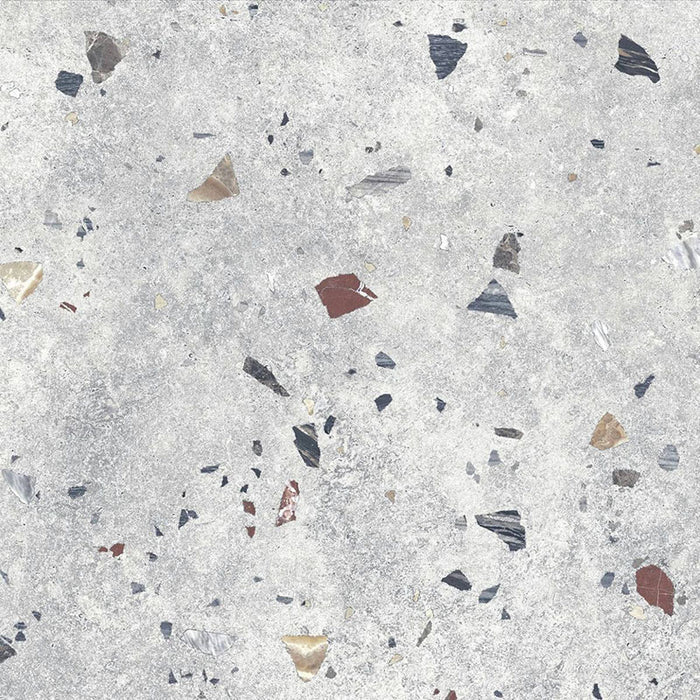 Flat lay of Tulsa Silver Terrazzo 66 × 66cm porcelain wall and floor tile, featuring a soft grey base with scattered multicoloured aggregate chips in varied sizes, creating a balanced, contemporary terrazzo effect with subtle movement and texture.
