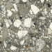Close-up of Venetian Emerald Matt 60cm x 60cm terrazzo effect porcelain tile, featuring rich green, grey and white stone-inspired aggregates with a matt finish for contemporary wall and floor designs.
