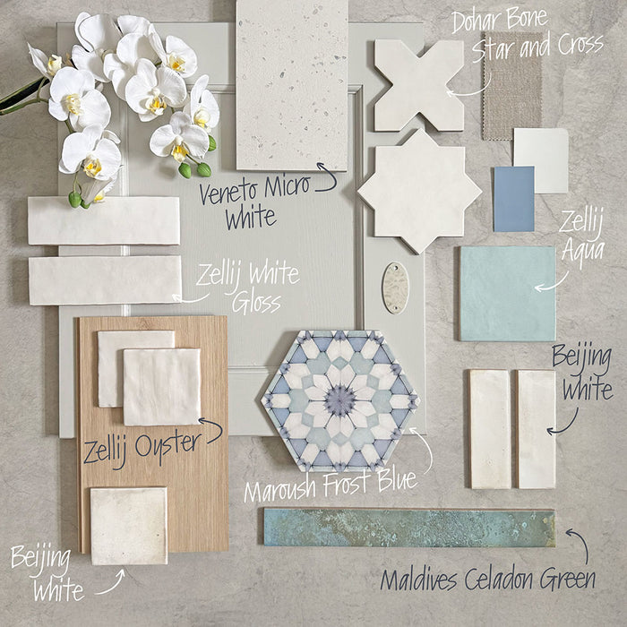 Moodboard featuring Veneto Micro White concrete effect porcelain tiles paired with Maroush Frost Blue hexagon patterned tiles, Zellij White Gloss and Oyster tiles, Beijing White wall tiles, Maldives Celadon Green brick tiles, Zellij Aqua, Dohar Bone Star and Cross tiles, creating a fresh coastal-inspired bathroom palette.