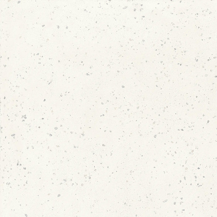 Close-up of Veneto Micro White concrete effect porcelain tile featuring a soft white background with delicate grey terrazzo flecks, creating a subtle, contemporary surface suitable for modern walls and floors.