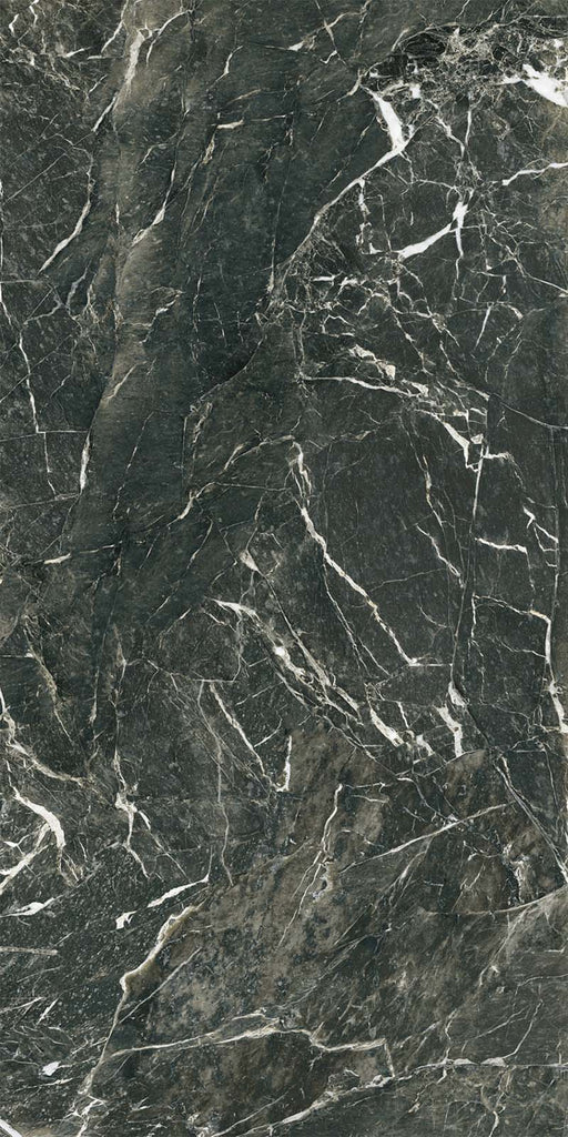 Close-up of Grand Verde Alpi Polished Marble effect 60 × 120cm porcelain tile, featuring deep green tones with bold white veining and a high-gloss finish that enhances depth, contrast, and natural movement.