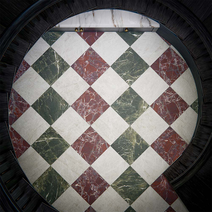 Overhead view of Grand Bazaar collection featuring porcelain tiles in a chequerboard layout, combining green, red, and neutral marble effect designs, framed by a curved architectural staircase for a bold, statement finish.