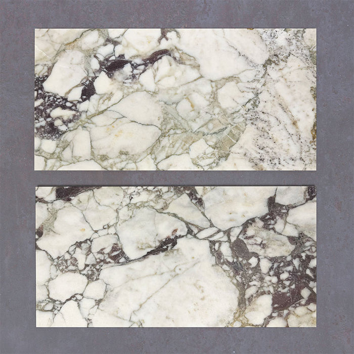 Close-up of Fitzrovia Viola natural marble tiles in a honed finish, 30.5x61cm format, showcasing a soft white base with striking violet and deep grey veining, creating a bold yet refined look for wall and floor applications.