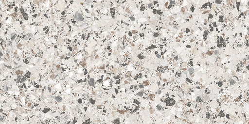 Close-up of the Vito Moonstone 60x120cm terrazzo style porcelain tile, featuring a soft light grey base with a blend of white, silver, charcoal and taupe stone fragments. The realistic 4D brushed finish enhances the texture and depth, creating an authentic terrazzo effect.