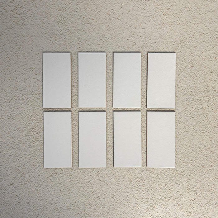 Flat lay of Finchley White 7.5 × 15cm ceramic tiles with a crackle glaze finish, showcasing subtle surface texture and tonal variation, ideal for classic and contemporary wall tile designs.