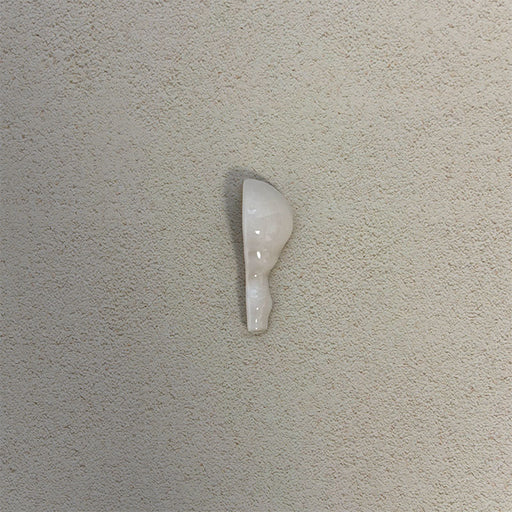 Detail view of Finchley White ceramic dado trim corner piece with a crackle glaze finish, designed to create a smooth, decorative transition and a polished edge in classic wall tile installations.