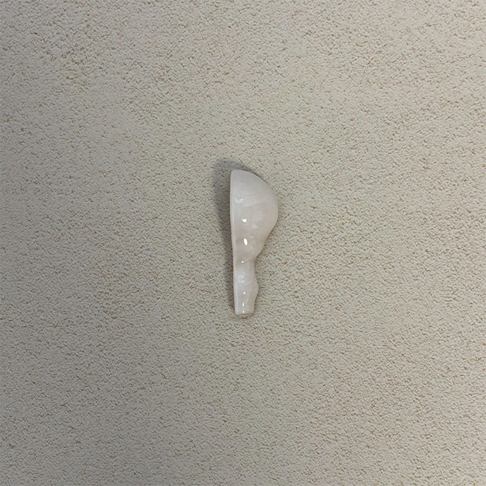 Detail view of Finchley White ceramic dado trim corner piece with a crackle glaze finish, designed to create a smooth, decorative transition and a polished edge in classic wall tile installations.