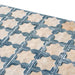 Close-up of Zeina Moroccan Arena Blue ceramic wall tiles featuring a Moroccan style geometric star pattern in soft cream and muted blue with a glossy finish and subtle aged effect, ideal for kitchen splashbacks, bathroom walls and feature walls.