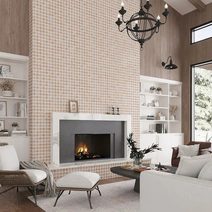 Living room featuring Zeina Moroccan Cotto White ceramic wall tiles in a repeating Moroccan style geometric pattern, creating a striking fireplace feature wall alongside a contemporary fireplace, white shelving, warm wood panelling and soft neutral furnishings.