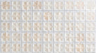 Close-up of Zeina Moroccan Natural White ceramic wall tiles featuring a repeating Moroccan style geometric star pattern in soft white and warm natural tones, with a glossy glazed finish, subtle shade variation and handcrafted-inspired detailing.