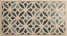 Close-up of Ziza Emerald Green Moroccan style decorative porcelain wall tile, featuring an intricate interlocking geometric floral pattern in rich emerald green, charcoal, soft sage and warm beige tones with a gently aged finish, perfect for creating statement bathroom walls, kitchen splashbacks and feature walls with timeless Moroccan-inspired character.