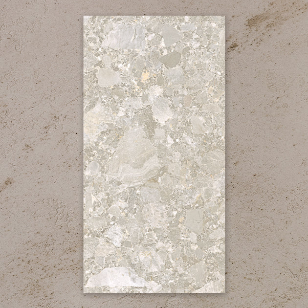 Contract Pebble Rock Avorio porcelain tile 60x120, stone-effect design with layered pebble fragments in beige and ivory shades