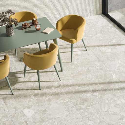 Contract Pebble Rock Blanca 60x120 porcelain floor tiles in dining area, light stone-effect surface with soft natural variation