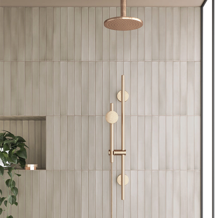 Maldives Almond Matt 5x40 porcelain wall tiles laid vertically in a neutral bathroom, creating a soft Mediterranean look with warm beige tones