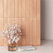 Vertical wall tiles in Maldives Clay matt porcelain, featuring warm clay tones and soft variation in a contemporary interior.