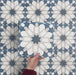 Video showcasing Soukaina Blue D Moroccan-style 20cm x 20cm patterned porcelain tiles, highlighting the bold central star design, rich blue and neutral colour palette, and matt finish when laid together.