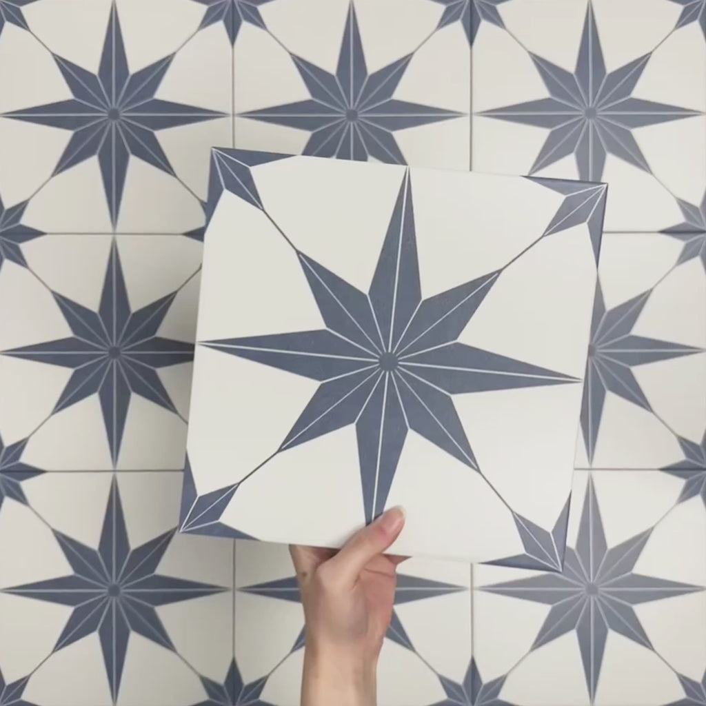 Video showcasing Pole Star Blue Moroccan-style 25x25cm patterned porcelain tiles, highlighting the blue star motif and repeating geometric design.