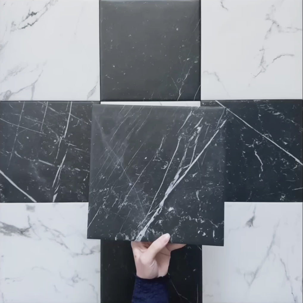 Video showcasing Calacatta Nero Black marble-effect 25×25cm porcelain tiles, highlighting the deep black base, striking white veining variation, and suitability for bold, elegant floors and walls in modern and classic interiors.