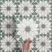 Video showcasing Soukaina Green D Moroccan-style 20cm x 20cm patterned porcelain tiles, highlighting the bold central star design, soft green and neutral colour palette, and matt finish when laid together.