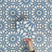Video showcasing Fizaan Azure Blue 20x20cm Moroccan-style porcelain tiles, highlighting the repeating geometric pattern and vibrant blue and white tones in close-up detail.