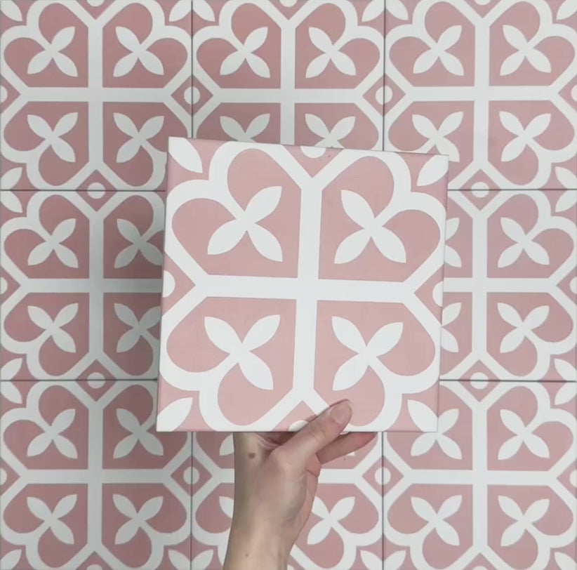 Video showcasing Iris Pink Victorian Moroccan-style 20x20cm patterned porcelain tiles, highlighting the soft pink and white geometric design and repeating pattern.