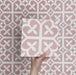 Video showcasing Iris Pink Victorian Moroccan-style 20x20cm patterned porcelain tiles, highlighting the soft pink and white geometric design and repeating pattern.