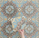 Video showcasing Europa Hanover 20x20cm Victorian Moroccan style tiles arranged together to showcase the repeating decorative pattern in blue, terracotta, mustard and cream tones.