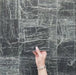 Video of Fitzrovia Verde tumbled natural marble tile in a 15.2cm x 15.2cm square format, featuring deep forest green tones with natural white veining, textured tumbled edges and an authentic aged stone finish.