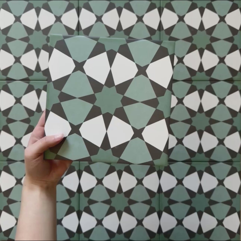 Video showcasing Agraba Verde 20x20cm Moroccan floor and wall tiles, featuring a green and white geometric star pattern with a handcrafted, traditional look perfect for kitchens and bathrooms.
