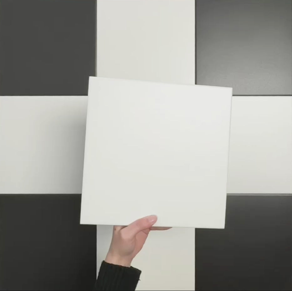 Video showcasing the Chessboard White 25×25cm Victorian-style porcelain tile, highlighting its smooth satin finish, crisp white tone, and suitability for classic black-and-white chequerboard flooring designs.