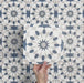 Video showcasing Soukaina Blue A Moroccan-style 20cm x 20cm patterned porcelain tiles, highlighting the blue and white geometric star design, matt finish, and seamless pattern flow when laid together.