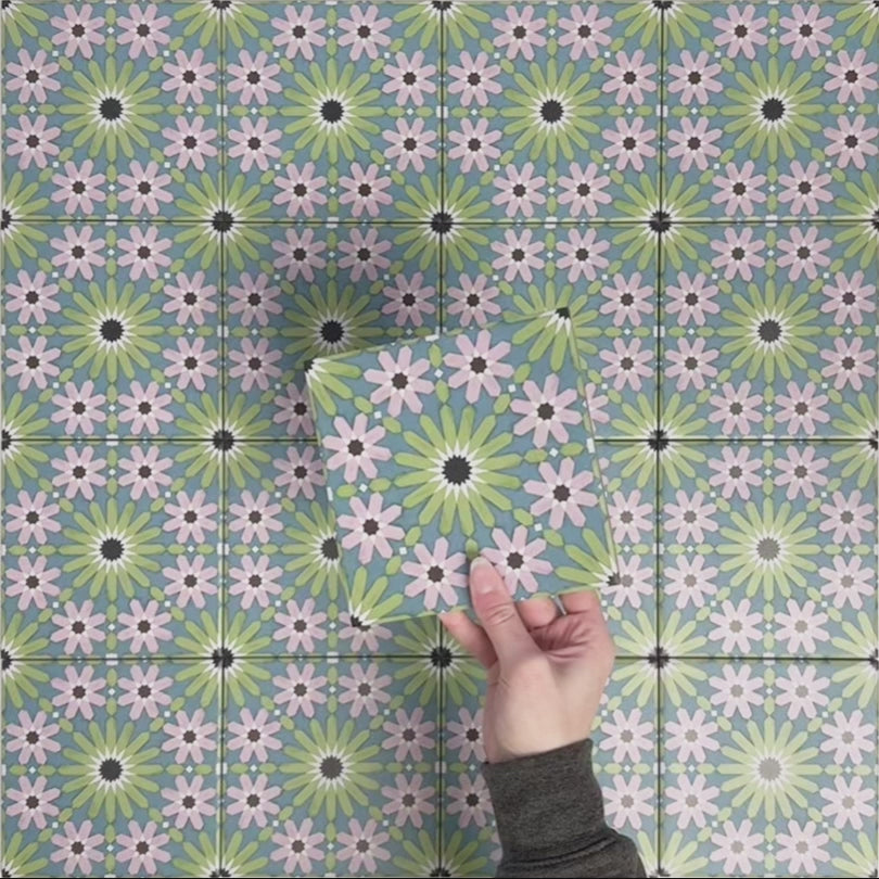 Video showcasing Fizaan Summer Mini Moroccan-style 15×15cm porcelain tiles, highlighting the blue, green and pink geometric floral pattern and surface detail.
