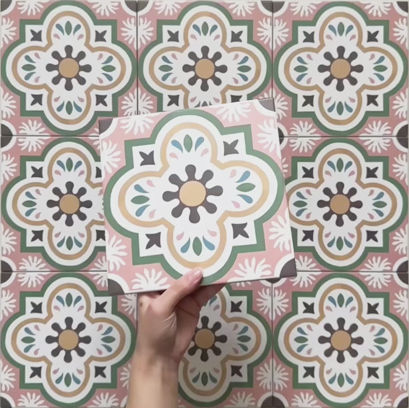 Video showcasing Cabana Paradise 20x20cm Moroccan-style ceramic tiles with a pink, green, and mustard floral pattern, highlighting surface texture and colour detail.