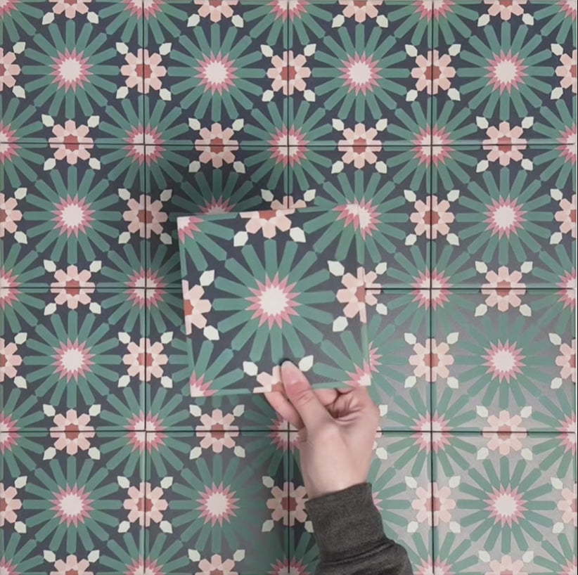 Video showcasing Fizaan Festive Blue Mini 15x15cm Moroccan-style porcelain tiles, highlighting the repeating geometric pattern and rich blue and green tones in close-up detail.