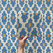 Video showcasing Cabana Zafini Mustard Azure 20x20cm Moroccan-style porcelain tiles featuring a geometric lattice pattern in azure blue and mustard yellow on a cream background, highlighting the intricate design and smooth matt finish