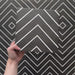 Alhambra Zig Zag Black 20x20cm Moroccan tile video showing the tile’s bold black background and white chevron pattern, highlighting its modern geometric design and smooth matt finish.