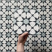 Video showcasing Agraba Azul Blue 20x20cm Moroccan-style ceramic tiles, highlighting their intricate navy, light blue, and white geometric star pattern with a smooth matt finish under natural light.
