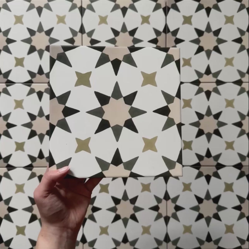 Video showcasing the Agraba Natural 20x20cm Moroccan tile, featuring a beige, olive, and taupe star pattern on a white background with a matte finish, perfect for creating timeless geometric interiors.