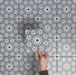 Video showcasing Fizaan Artisan Mini Moroccan-style 15×15cm porcelain tiles, highlighting the blue, green and soft pink geometric star pattern and surface detail.
