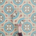 Video showcasing Europa Helsinki 20x20cm Victorian Moroccan style tiles arranged together to showcase the repeating geometric pattern in teal, terracotta, cream and black tones.