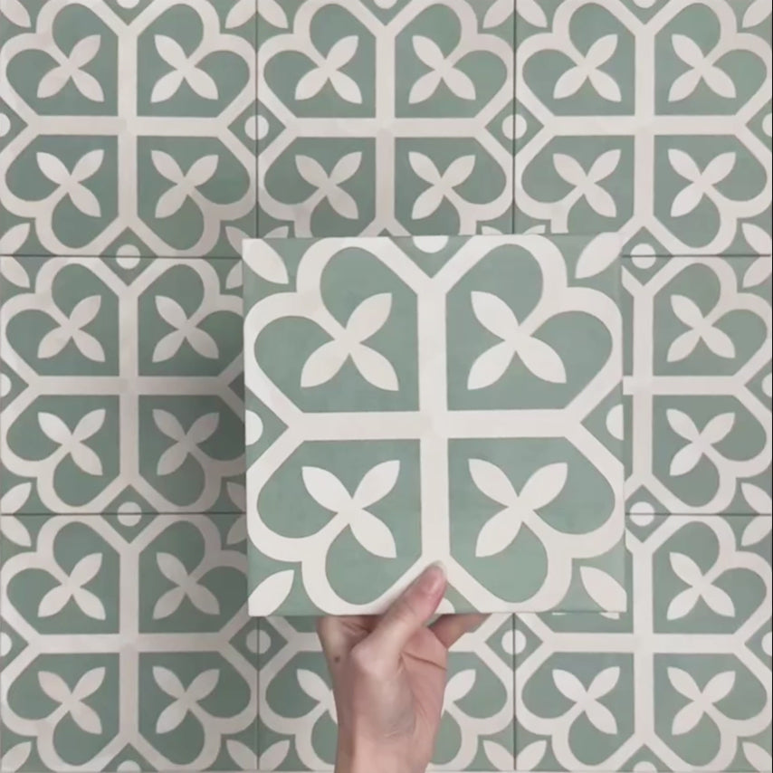 Video showcasing Iris Green Victorian Moroccan-style 20×20cm porcelain tiles, highlighting the soft green and cream geometric pattern and their suitability for decorative floors and walls in both classic and contemporary interiors.