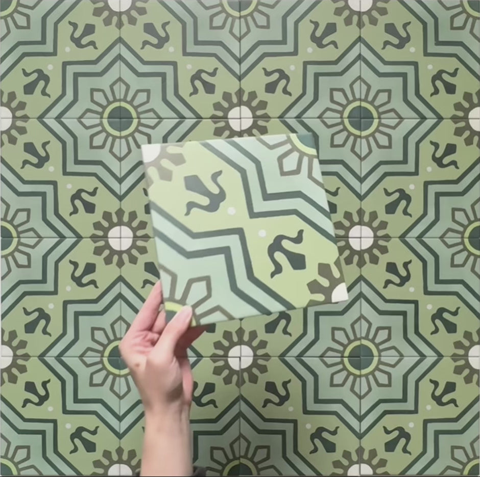 Video showcasing Brompton Verde 20x20 cm Victorian-style tiles featuring a repeating geometric star and floral pattern in green, teal, and cream tones, shown in soft lighting to highlight the matte finish and intricate design.